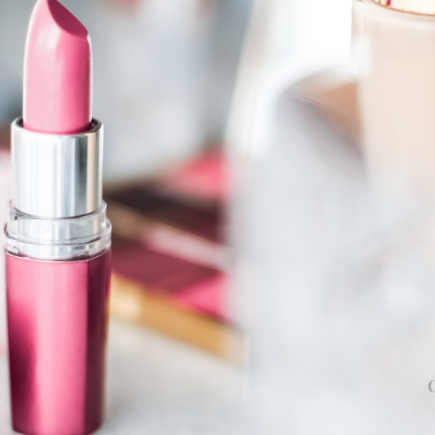 A minimalist studio-style shot of cosmetics to highlight PFAS in supply-chain.